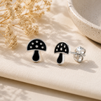 Black Mushroom Stud Earrings with Silver Detailing