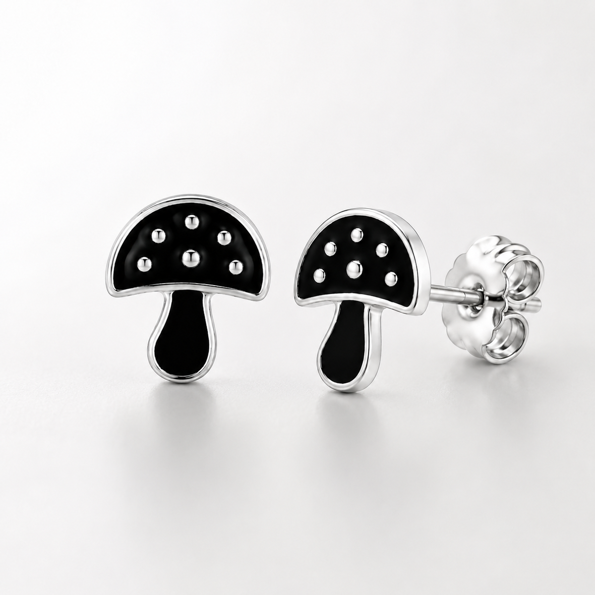 Black Mushroom Stud Earrings with Silver Detailing
