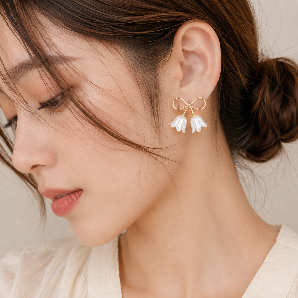 Gold Bow Floral Drop Earrings with White Petal Charms