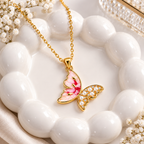 Gold Butterfly Pendant Necklace with Pink Enamel & Pearl Detailing