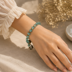 Turquoise Beaded Bracelet with Gold-Tone Charms