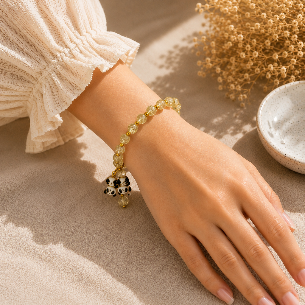 Green Beaded Bracelet with Teddy Bear Charm