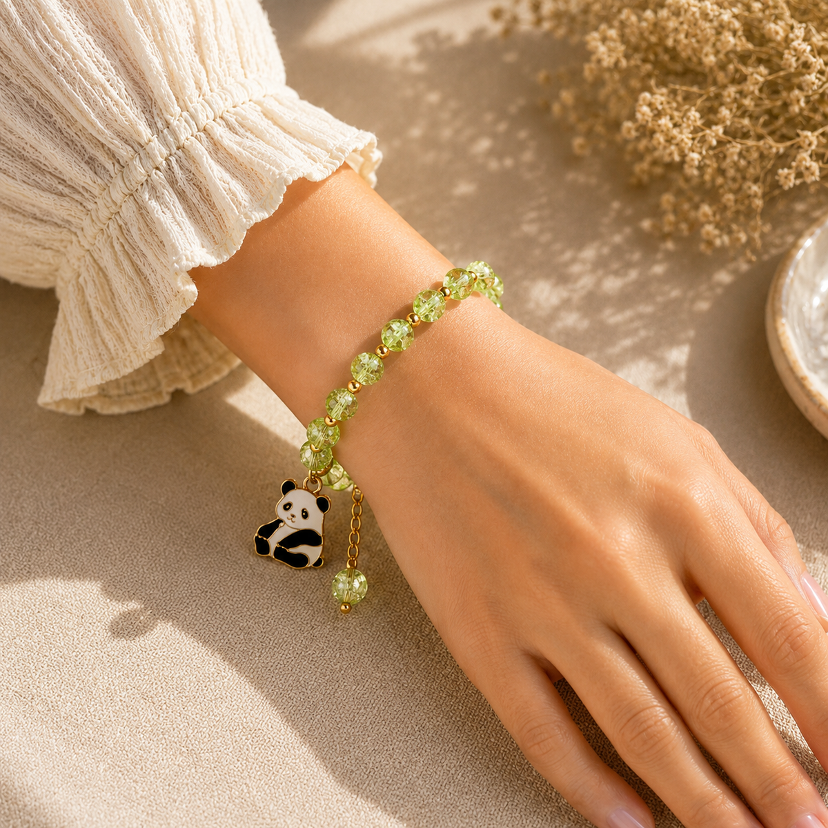 Green Beaded Bracelet with Teddy Bear Charm