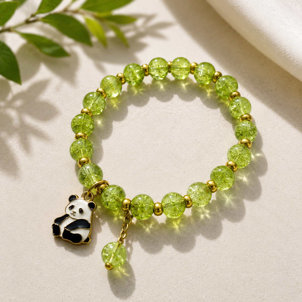 Green Beaded Bracelet with Teddy Bear Charm