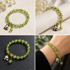 Green Beaded Bracelet with Teddy Bear Charm