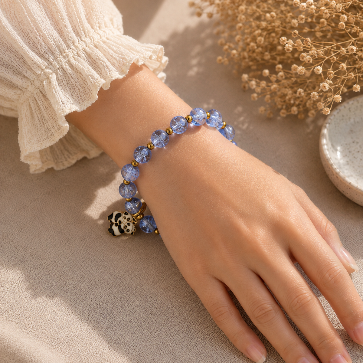 Blue Beaded Bracelet with Teddy Bear Charm