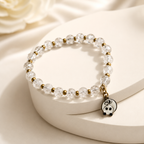 White & Gold Beaded Bracelet with Teddy Bear Charm